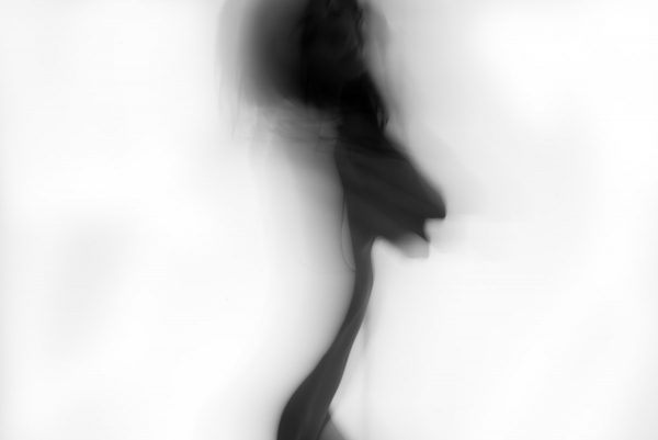 "Shadow Whisper" presents the emergence of a distinct artistic vocabulary in which slow shutter images grasp at the expanse for which the human form is a vessel. Limited edition, black and white print by photographer Aranka Israni